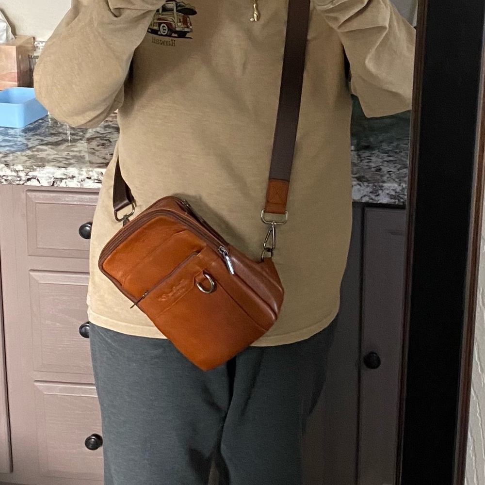 Brown Crossbody Bag with Adjustable Strap and Metal Hardware